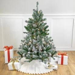 4.5' Pre-Lit Full Flocked Natural Emerald Artificial Christmas Tree - Warm Clear Lights